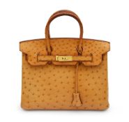 An Hermes golden brown/camel ostrich Birkin 30 bag