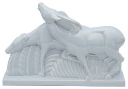 Charles Lemanceau A French Art Deco pale blue pottery figure group of two stylised deer