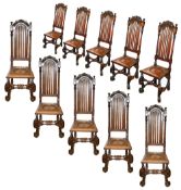 A set of ten William and Mary style oak high slat back dining chairs