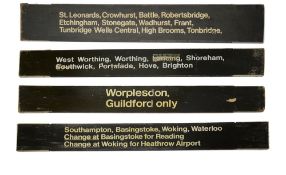 A group of Southern Railway wooden destination boards