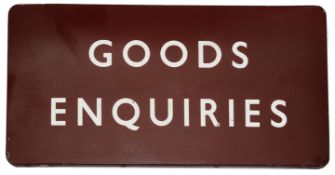 A BR(M) enamel sign displaying 'GOODS ENQUIRIES',white lettering on maroon ground, height 45.7cm,