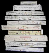 A group of paper and vinyl London Underground carriage line diagrams