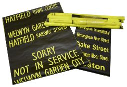 A bundle (9) of black on yellow destination blinds