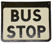 A cast iron Bus Stop sign