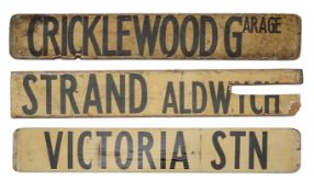 Three double sided wooden destination signs
