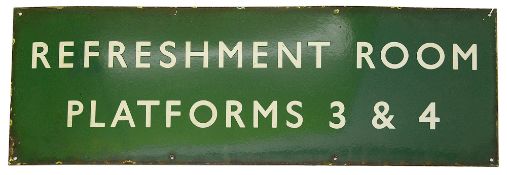 A BR(S) enamel sign displaying 'REFRESHMENT ROOM / PLATFORMS 3 & 4,with white letters on a green
