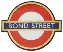 A London Underground Bond Street enamel 'bullseye' roundel sign,in bronze frame and mounted on