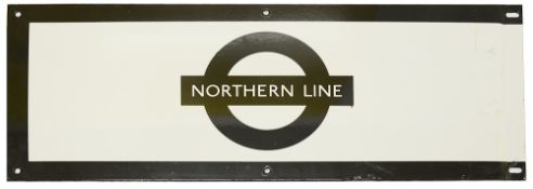 A London Underground enamel station frieze sign for 'NORTHERN LINE',black edging and roundel on