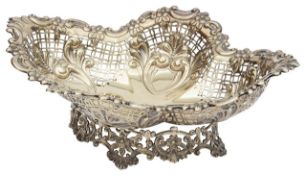 An Edwardian silver-gilt pierced dish
