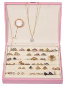 A large collection of contemporary gold, diamond and gem set jewellery