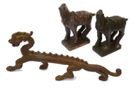 A Chinese bronze figure of a standing dragon and two Tang style bronze horses, (3)