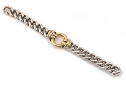 A heavy vintage Hermes gold and silver ring and knot bracelet