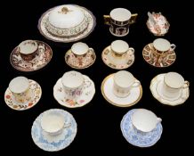 A collection of Royal Crown Derby coffee cups and saucers to include muffin dish and cover