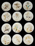 A set of eleven Aesthetic Movement dessert plates and a comport top by E.J.D. Bodley, Burslem,