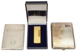 Two Austrian .900 silver cigarette cases and a cased Dunhill gold plated rollagas cigarette lighter