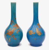 A pair of Japanese Kyoto Meiji Period Awaji pottery monochrome bottle vases