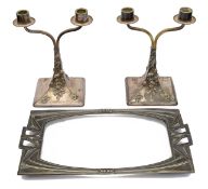 A pair of Austrian Jugendstil silver plated twin branch candelabra by Moritz Hacker
