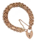 An early 20th century fancy link 9ct gold gate bracelet