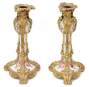 A pair of late 19th c. Fr. ormolu mounted porcelain candlesticks