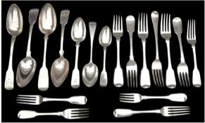 A collection of George III and later silver mostly fiddle pattern flatware