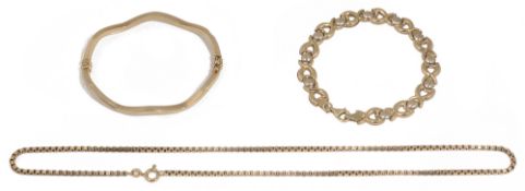 A 9ct gold stiff bangle