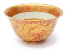 A Chinese porcelain coral ground and gilt decorated 'Kinrande' style deep bowl