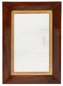 A late Regency rosewood cushion framed wall mirror c.1830