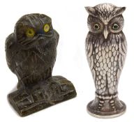 A labradorite carving of an owl perched on log and a continental silver plated desk seal
