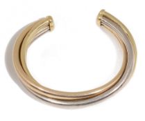 A Cartier three colour gold Trinity open bangle