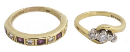 A three stone diamond ring and a diamond and ruby ring