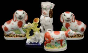 A group of 19th century and later Staffordshire pottery animals,