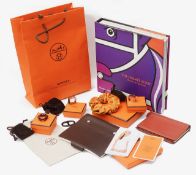 A collection of Hermes accessories