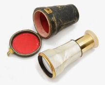 A 19th century French brass and mother of pearl monocular,
