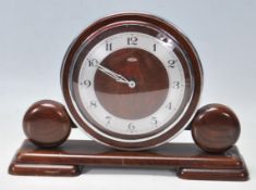 A METAMEC ART DECO 1950S OAK CASED MANTEL CLOCK WITH BAKELITE CASE