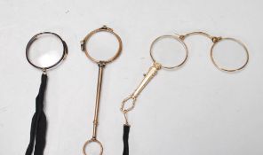 TWO 20TH CENTURY ANTIQUE GOLD PLATED OPERA GLASSES AND MONOCLE