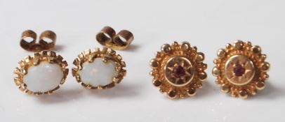 TWO PAIRS OF 9CT GOLD STUD EARRINGS