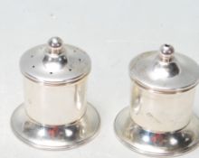 PAIR OF STERLING SILVER HALLMARKED SALT AND PEPPER SHAKERS
