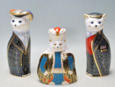 THREE ROYAL CROWN DERBY 'ROYAL CATS' FIGURINES TO INCLUDE PEARLY KING, PEARLY QUEEN AND PERSIAN.