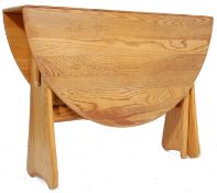 A VINTAGE 20TH CENTURY BEECH AND ELM WOOD DROP LEAF GATE LEG TABLE