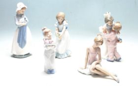 FIVE VINTAGE NAO BY LLADRO CERAMIC FIGURINES