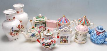 GROUP OF VINTAGE 20TH CERAMIC TEAPOTS AND VASES