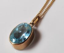 9CT GOLD HALLMARKED BLUE STONE PENDANT AND CHAIN