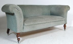 A 19TH CENTURY VICTORIAN MAHOGANY CHESTERFIELD STYLE SOFA SETTEE