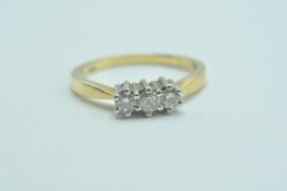 18CT / 750 GOLD AND 3 STONE DIAMOND RING