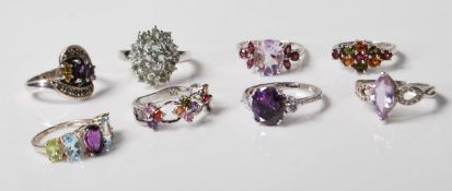 COLLECTION OF STAMPED 925 SILVER RINGS IN VARIOUS SIZES.