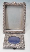 TWO EARLY 20TH CENTURY SILVER HALLMARKED PHOTO FRAMES