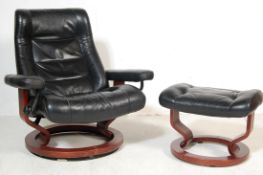 EKORNES STRESSLESS LEATHER RECLINING ARMCHAIR AND OTTOMAN