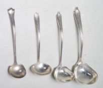 FOUR STERLING SILVER AMERICAN LADELS