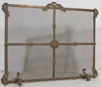 EARLY 20TH CENTURY BRASS AND MESH FIRE SCREEN