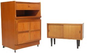 TWO MID CENTURY RETRO TEAK CABINETS.